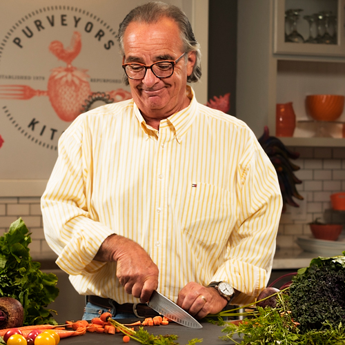 John Foley chopping carrots