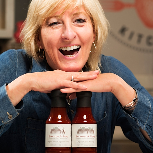 Karen Foley smiling with ketchup